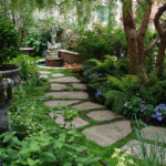 Stepping Stone Pathway with Green Details and Statues